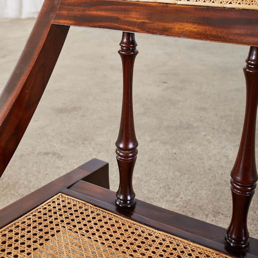 Turned wooden bars supporting the backrest of the colonial chair